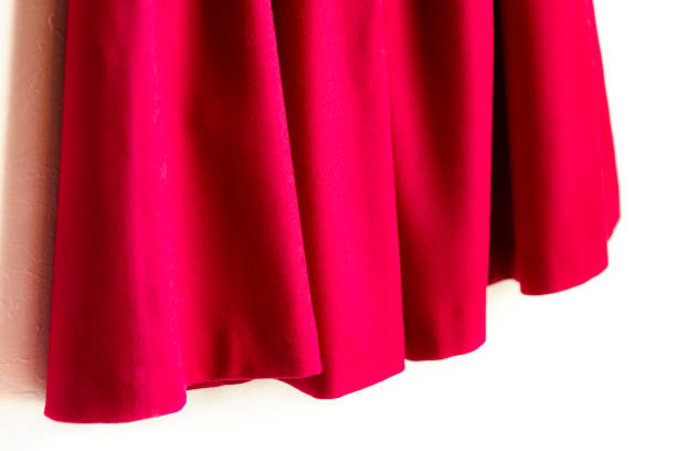 istock Red women skirt isolated on white background. 1077520382
