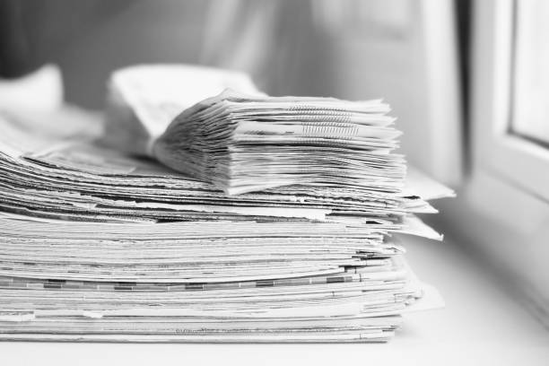 istock Newspapers and money 1077522826