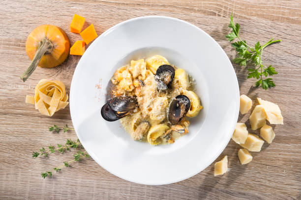 istock pasta with mussels and pumpkin 1077523372