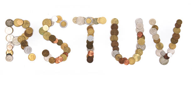 istock alphabet from old european coins 1077526106