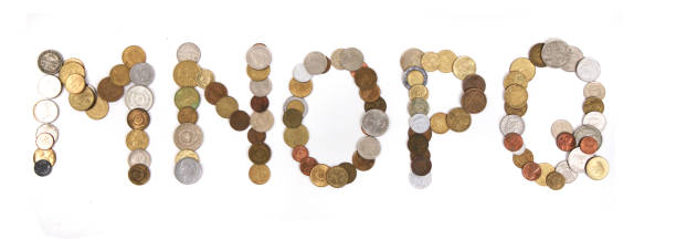 istock alphabet from old european coins 1077526110