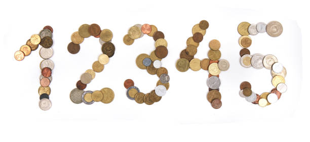 istock alphabet from old european coins 1077526126