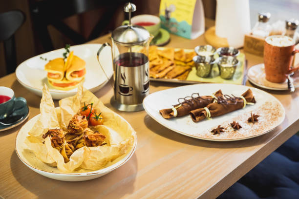 istock Pancakes desserts and tea on table. Table with tasty food. 1077528210