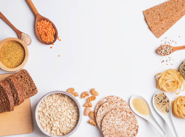 istock Different types of high carbohydrate food on the white background. 1077539166