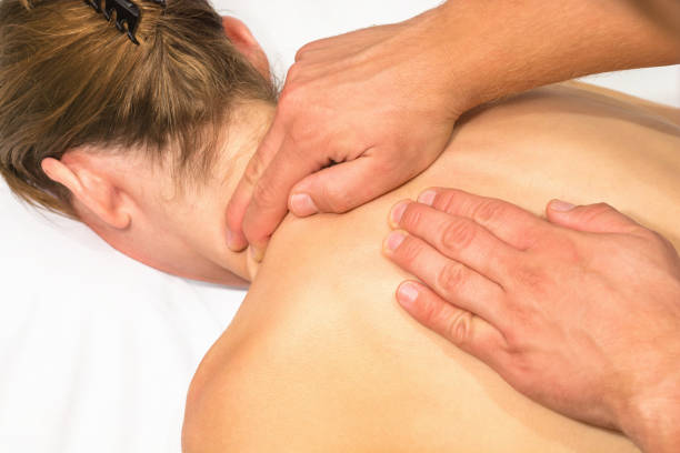 istock Professional shoulder massage to eliminate tension 1077542082