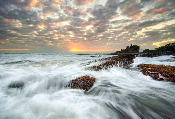 istock tanah lot sunset 1077544660