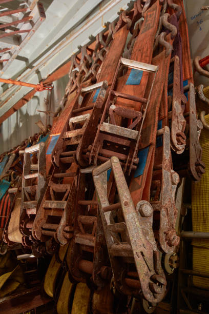 istock Plenty of polyester webbing lashing, lashing belts, straps and ratchets stowed in lashing container 1077545402