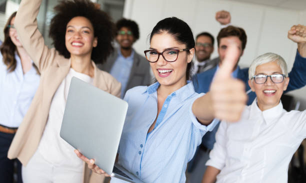 istock Group of successful business people in office 1077547192