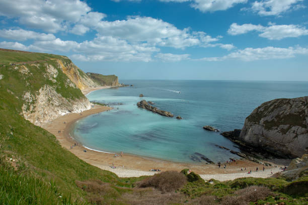 istock Lulworth Cove, coast in Dorset 1077553122