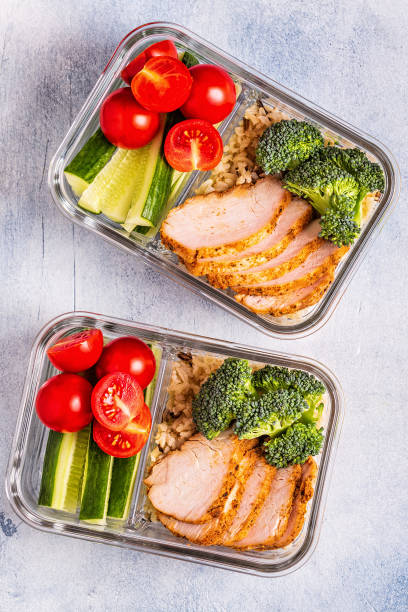 istock Healthy balanced lunch box with chicken, rice, vegetables 1077554808