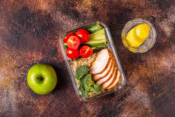 istock Healthy balanced lunch box with chicken, rice, vegetables 1077554862
