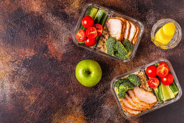 istock Healthy balanced lunch box with chicken, rice, vegetables 1077554874