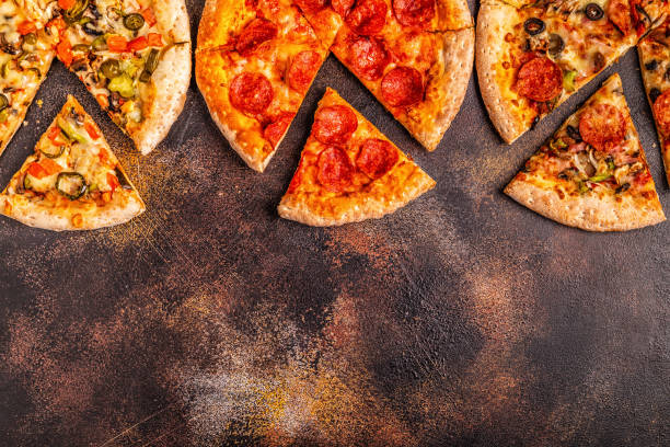 istock Set of different pizzas - pepperoni, vegetarian, chicken with vegetables 1077555086
