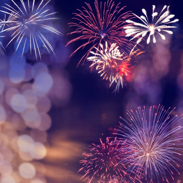 istock fireworks at New Year and copy space - abstract holiday background 1077561424