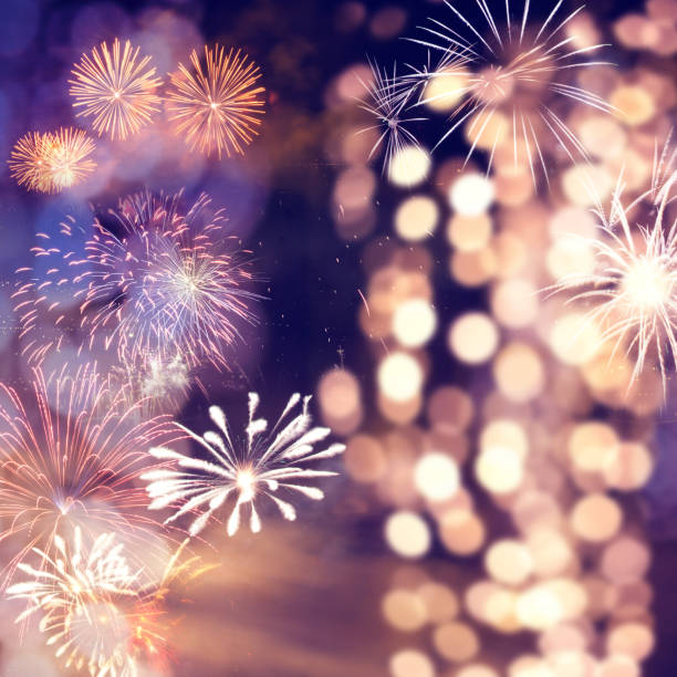 istock fireworks at New Year and copy space - abstract holiday background 1077561438