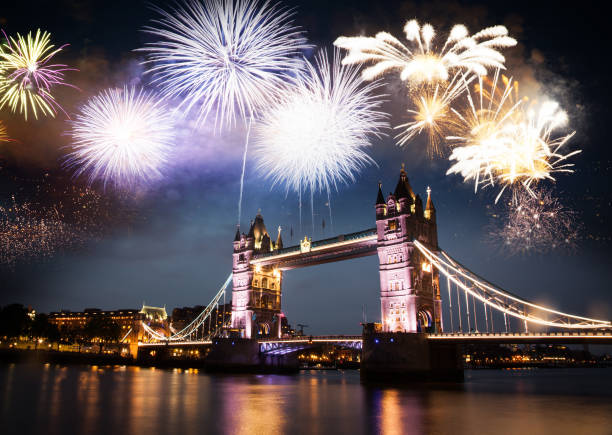 celebratory fireworks over Tower Bridge - New Year destination.  London.  UK stock photo
