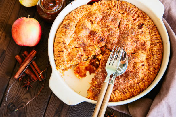 istock Top view of american apple pie with caramel. 1077563562