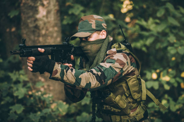istock Army soldier in the wild 1077564172