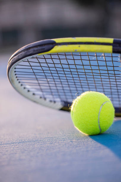 istock Tennis ball and  racket 1077567656