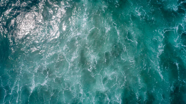 istock Drone aerial view of sea wave surface 1077568040