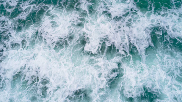 istock Drone aerial view of sea wave surface 1077569506