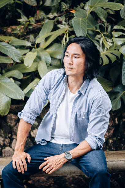 istock Young Asian man portrait 1077574928