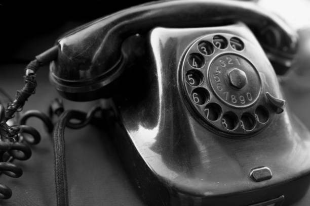 istock Old vintage antique black phone with rotary disc 1077574960