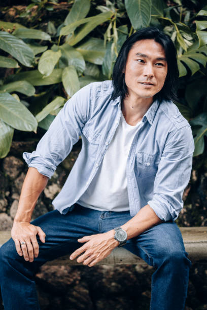 istock Young Asian man portrait 1077574966