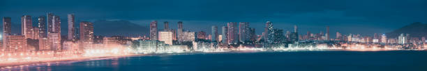 istock panoramic view of Benidorm seaside in night 1077575482