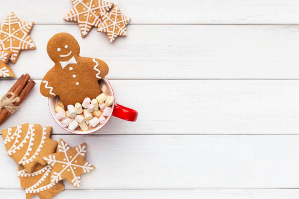 istock Gingerbread cookies on table in cup of hot chocolate 1077576890