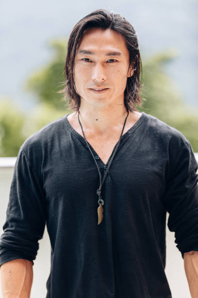 istock Young Asian man portrait 1077581526