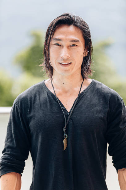 istock Young Asian man portrait 1077581696
