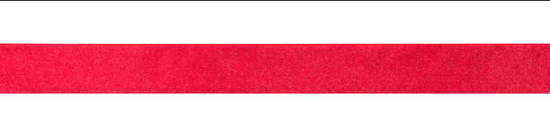istock Red ribbon band stripe or satin fabric bow isolated on white background with clipping path for banner design, greeting card and Christmas gift decoration 1077587330