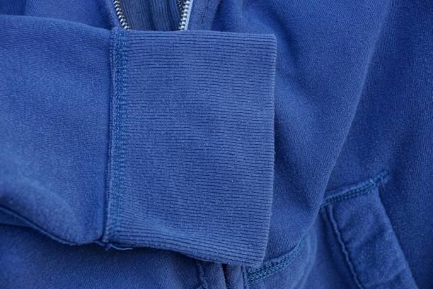 istock blue gray fabric texture of clothes with sleeves 1077588552