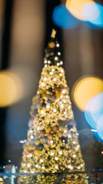 istock Background Christmas Tree Decoration blurred lights 1077591770