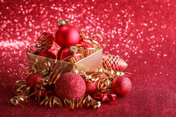 istock Christmas composition of Christmas tree toys on a blurred red background 1077592010