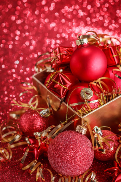 istock Christmas composition of Christmas tree toys on a blurred red background 1077594014