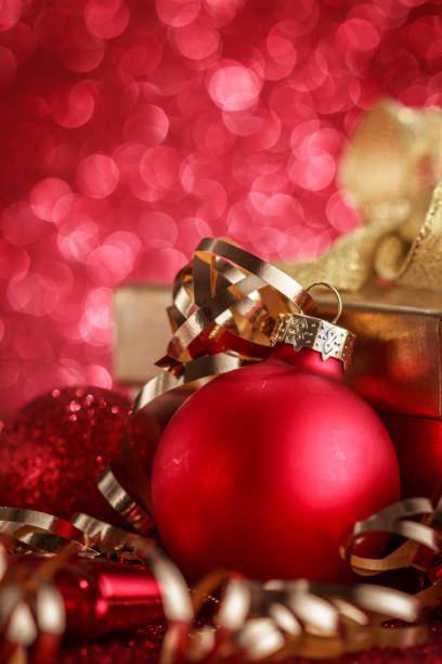 istock Christmas composition of Christmas tree toys on a blurred red background 1077594676