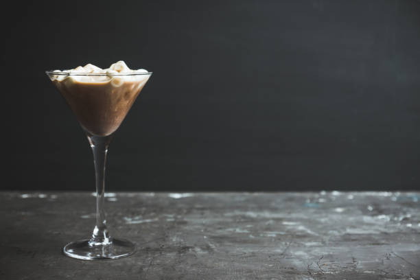 istock Chocolate martini with spices and marshmallow on the rustic background 1077600170