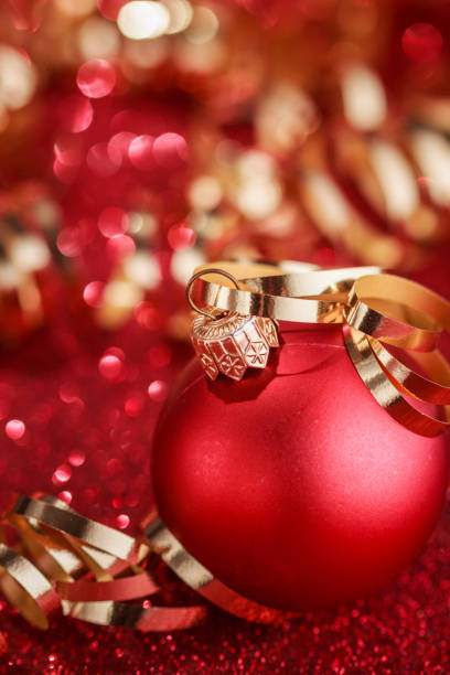 istock Christmas composition of Christmas tree toys on a blurred red background 1077600220