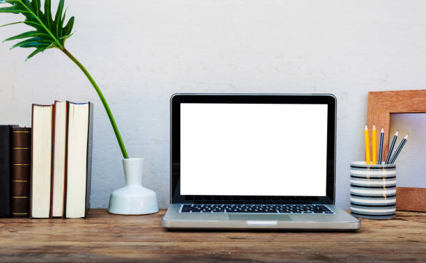 istock Mockup laptop with decorative website designer stationery. 1077601002