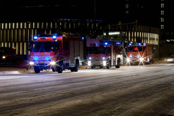 German Firetrucks on an icy road - night shot