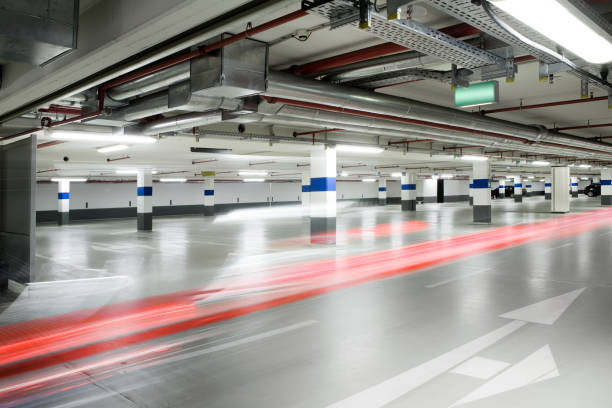 istock Parking garage, cars passing by - long exposure 1077601354