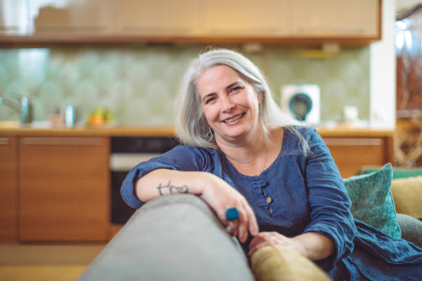 istock Mature woman at home 1077604082