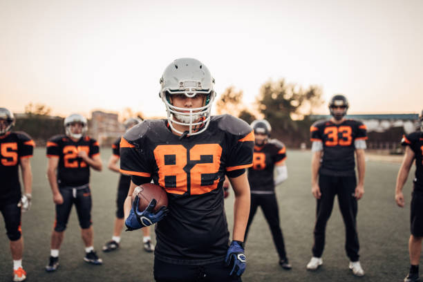 istock American football team on field 1077608828
