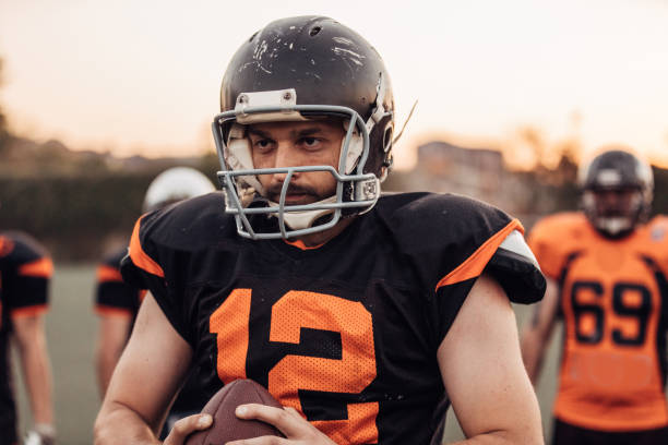 istock American football players on training 1077608910