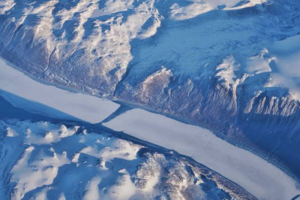 istock High Angle View Of Snowcapped Mountains Against Sky 1077608916