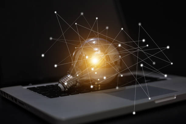 istock Light bulb and laptop,ideas concept,Light bulbs with ideas 1077615110