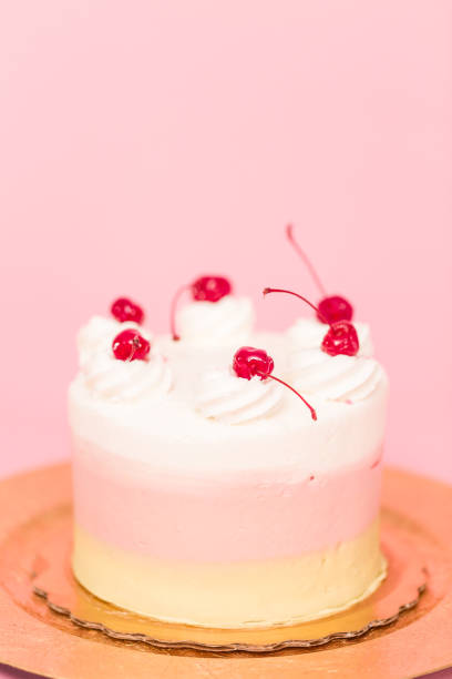 istock Birthday Spumoni cake on pink background. 1077620834