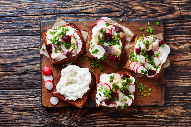 istock Smorrebrod with fish on a board 1077623838